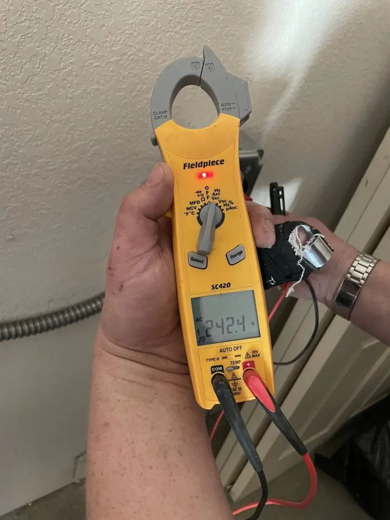 Voltage testing with clamp meter during Aluminum Wiring Replacement in Springfield